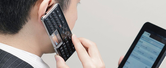Wireless Bluetooth keyboard lets you make calls too! 1 Bluetooth-keyboard